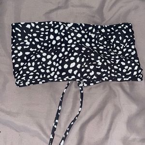 Spotted black and white bathing suit top